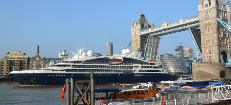 Ponant’s Le Lapérouse cruise vessel passing under the iconic London Bridge during Thames port call handled by GAC UK on 14th May 2018